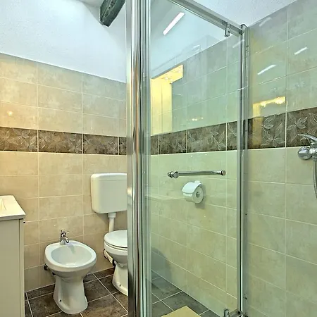 Handsome Stone Holiday Home With Swimming Pool In Tinjan Tinjan